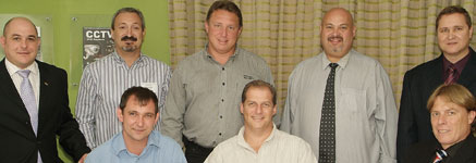 Standing left to right: Philip Smerkovitz, Anthony Rosenbaum, Alvin Flaum, Johnny Dempsey, and Mark de Koker. Seated left to right: Willie Claassen, Jan Schoeman, and Roy Wyman